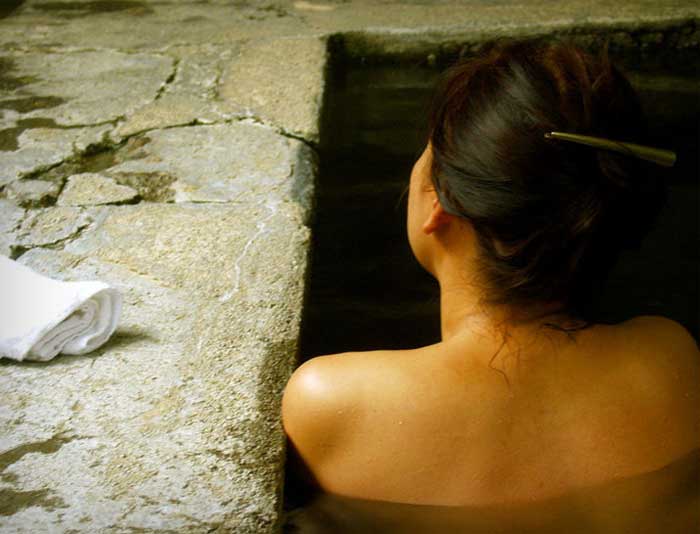 Woman in an herbal bath