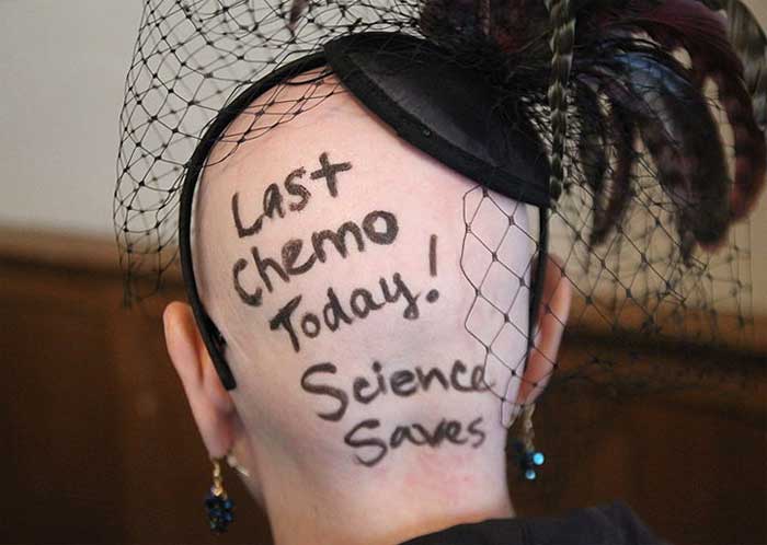 Photo of cancer patient in black hat
