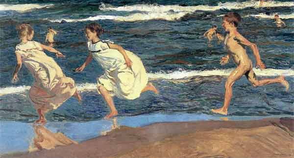 Children running of beach getting exercise