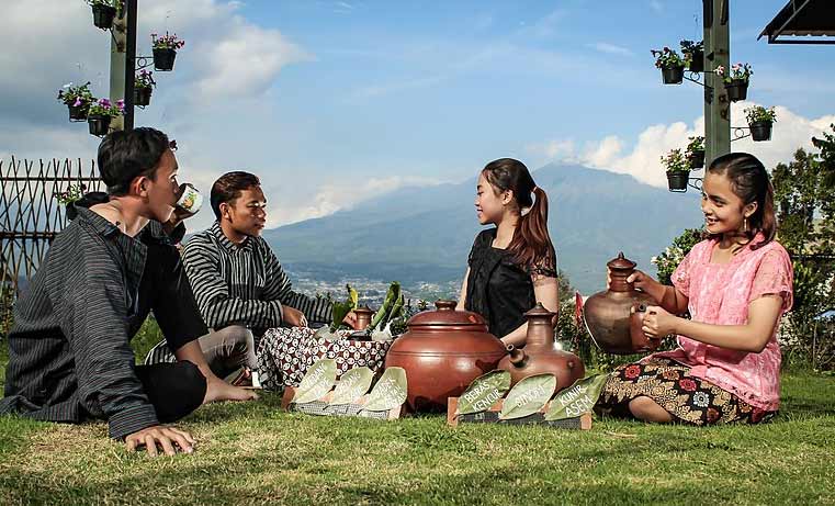 family drinking herbal tea