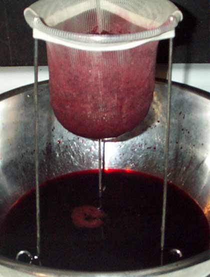 Straining blackberry juice