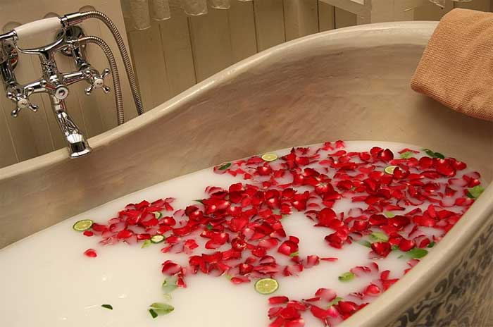Milk bath with rose petals