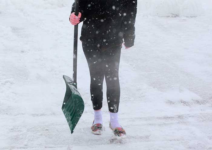 Shoveling snow in cold weather