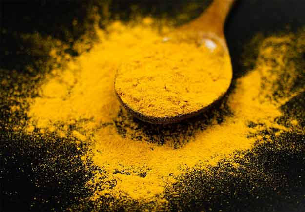 spoonful of powdered turmeric