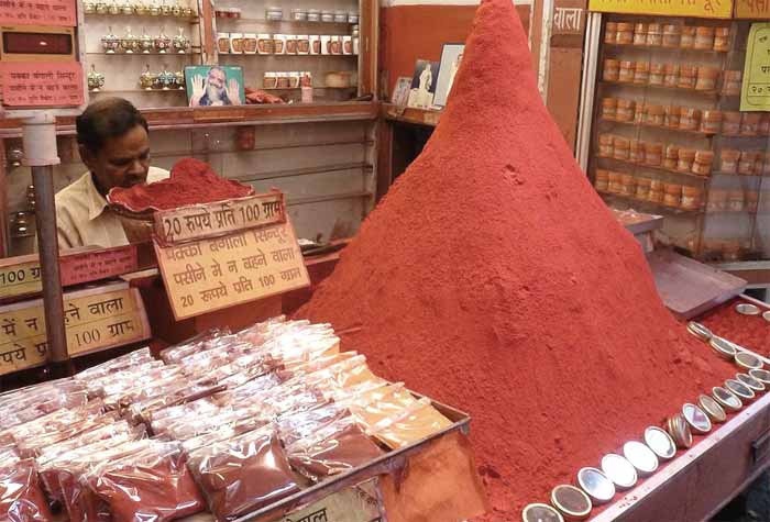 Turmeric is piled high in this Indian store.